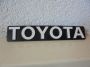 Embleem grille voorzijde Toyota Carina (T15) ‘83-‘86 Origineel nieuw