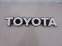Logo “TOYOTA“ op achterklep Corolla (E8) ‘83-‘84 Liftback Origineel nieuw